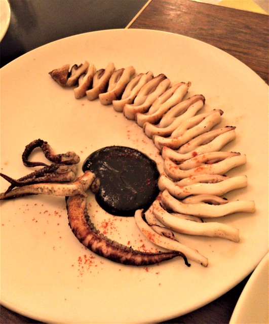 Ester wood fired calamari with squid ink soubise